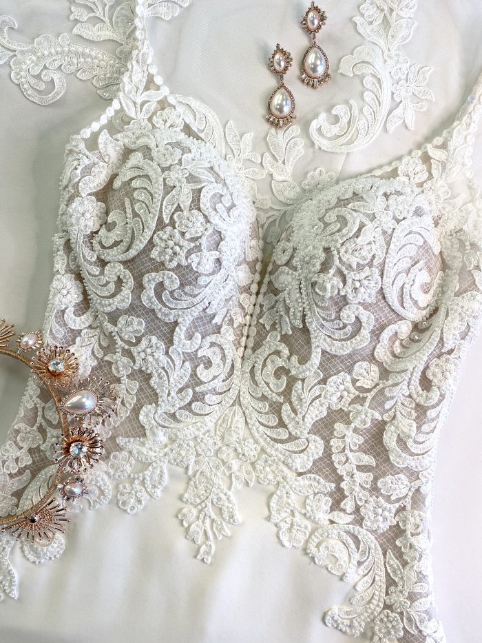 Flat Lay Image Of Crepe Wedding Dress Called Nikki By Maggie Sottero