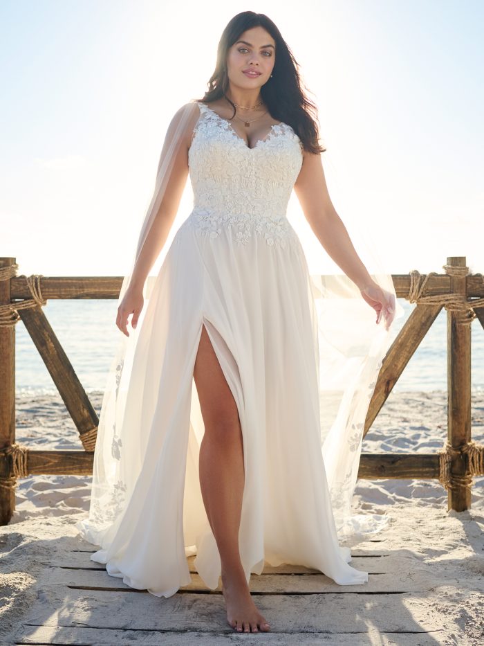 Bride In Bridal Gown With Thigh High Slit Wedding Dress Trends Called Maeve By Rebecca Ingram