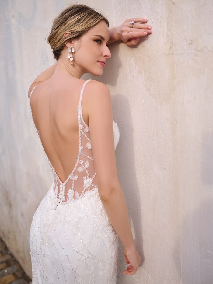 Bride In Beaded Wedding Dress With Bridal Accessories Called Evangeline By Sottero And Midgley