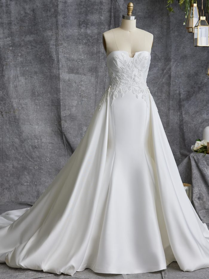 Mannequin Wearing Wedding Dress Called Italiana Lane By Sottero And Midgley With Detachable Overskirt
