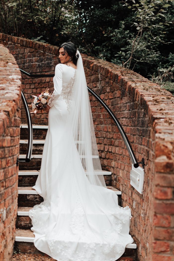 Bride In Celestial Wedding Dress Called Aston By Sottero and Midgley
