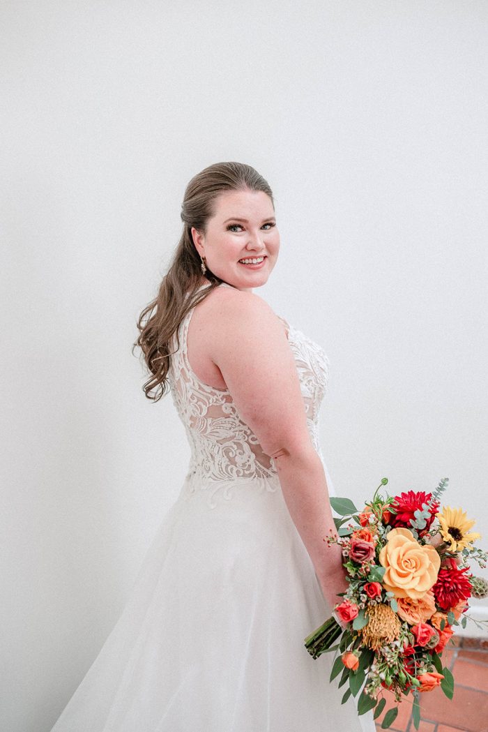 Bride In Halter Neck Affordable Wedding Gown Called Ardelle By Rebecca Ingram