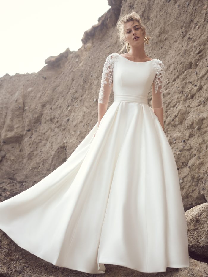 Bride In High Neck Wedding Dress Called Magdalena By Sottero And Midgley