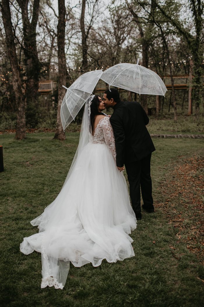 Bride In Lace Wedding Dress Called Mallory Dawn By Maggie Sottero In The Rain