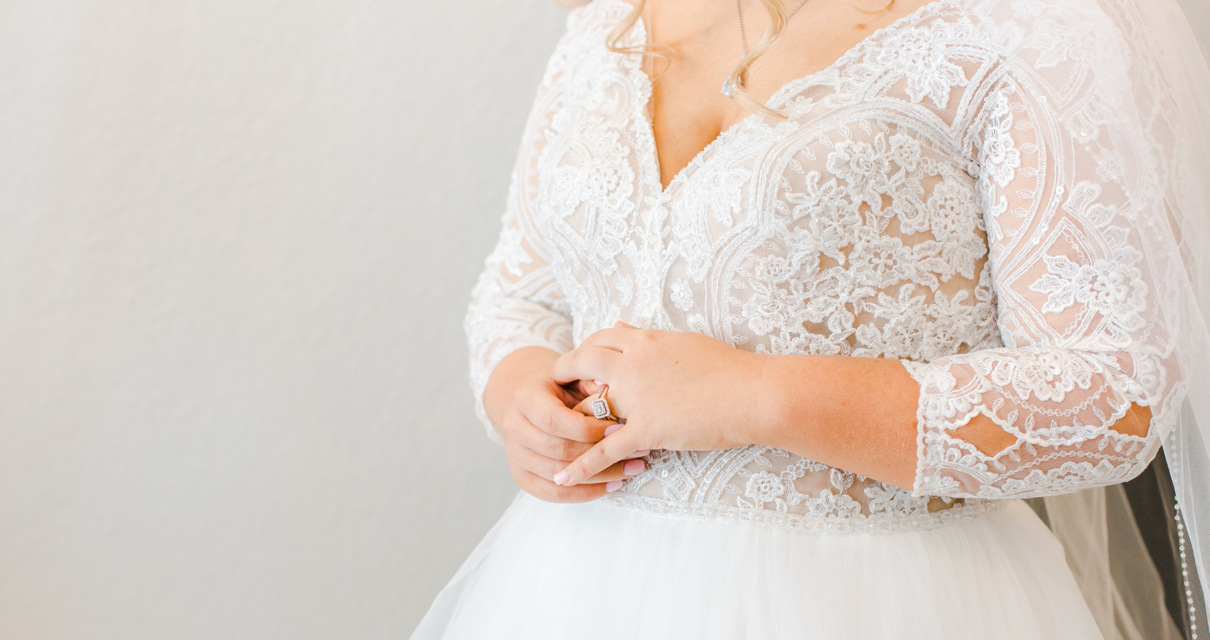 Bride In Long Sleeve Lace Wedding Dress Called Mallory Dawn By Maggie Sottero With Traditional Engagement Ring Styles