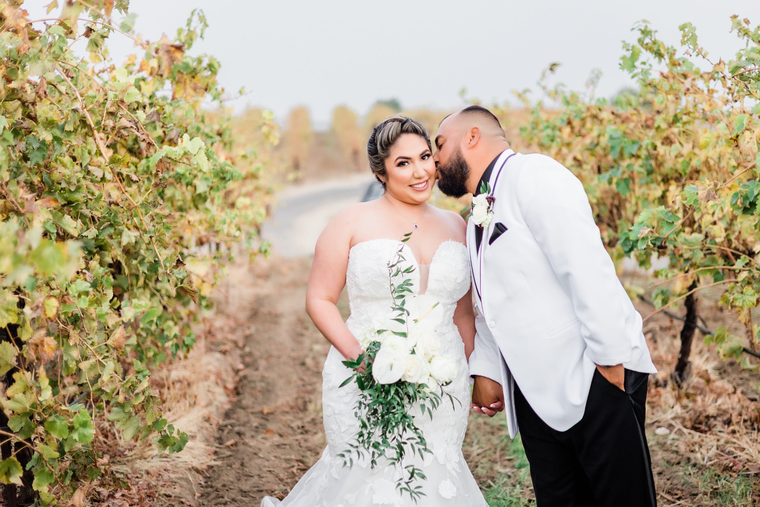 Bride In Floral Mermaid Wedding Dress Called Hattie By Rebecca Ingram With Groom