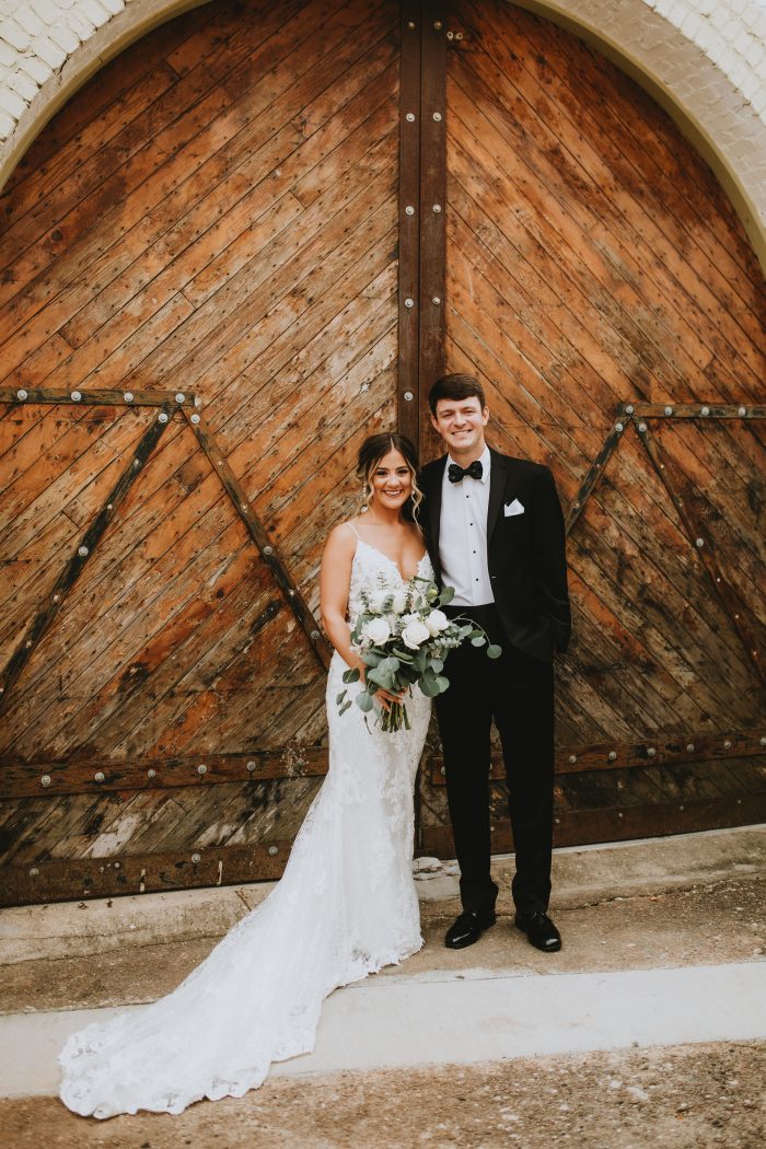 Bride In Lace Fit And Flare Wedding Dress Called Tuscany Lynette By Maggie Sottero With Groom