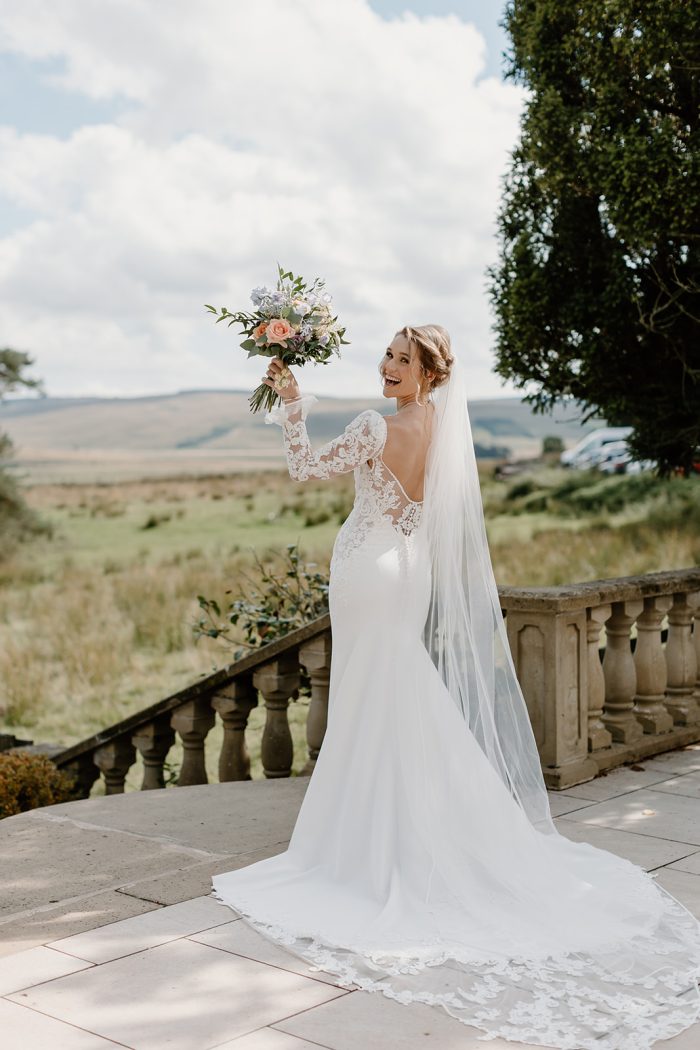 Photo Of Bride In Crepe Fit And Flare Wedding Dress Called Stevie By Maggie Sottero
