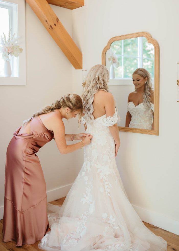 Bride wearing Hattie Lynette by Rebecca Ingram and focusing on her mental wellness tips