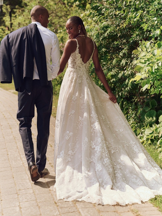 Bride wearing one of our romantic wedding dresses called Jerrica by Maggie Sottero