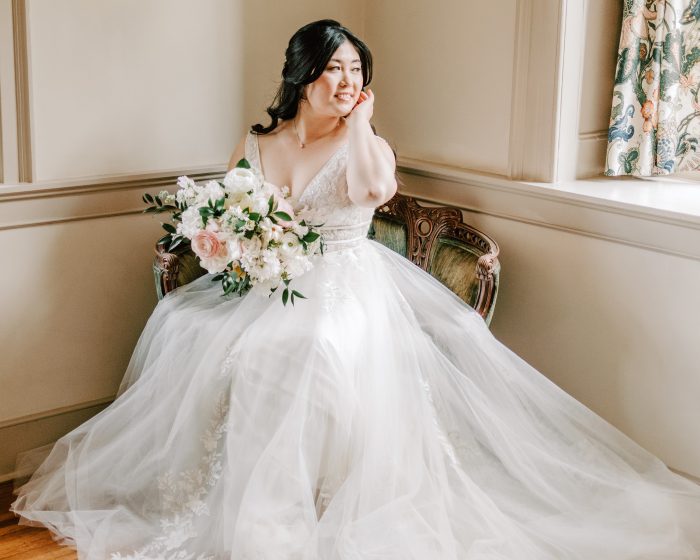 Bride wearing Raelynn by Rebecca Ingram