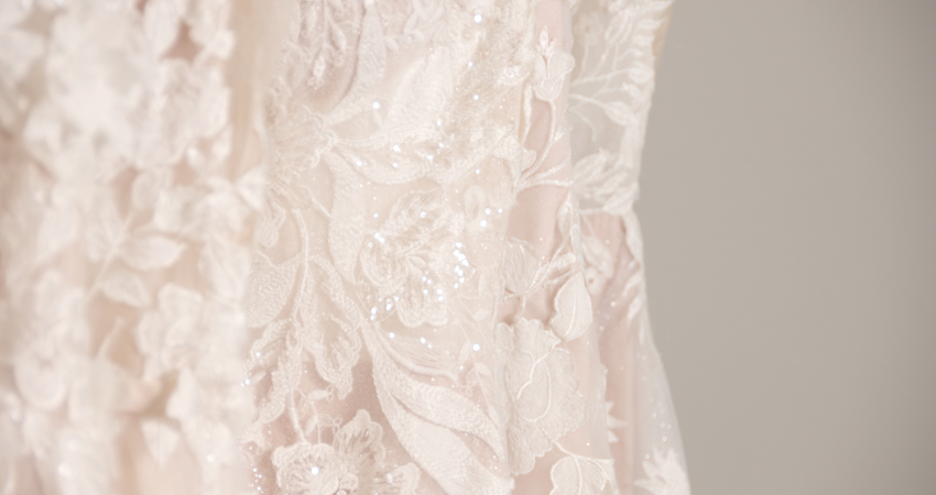 Close up of lace wedding dress