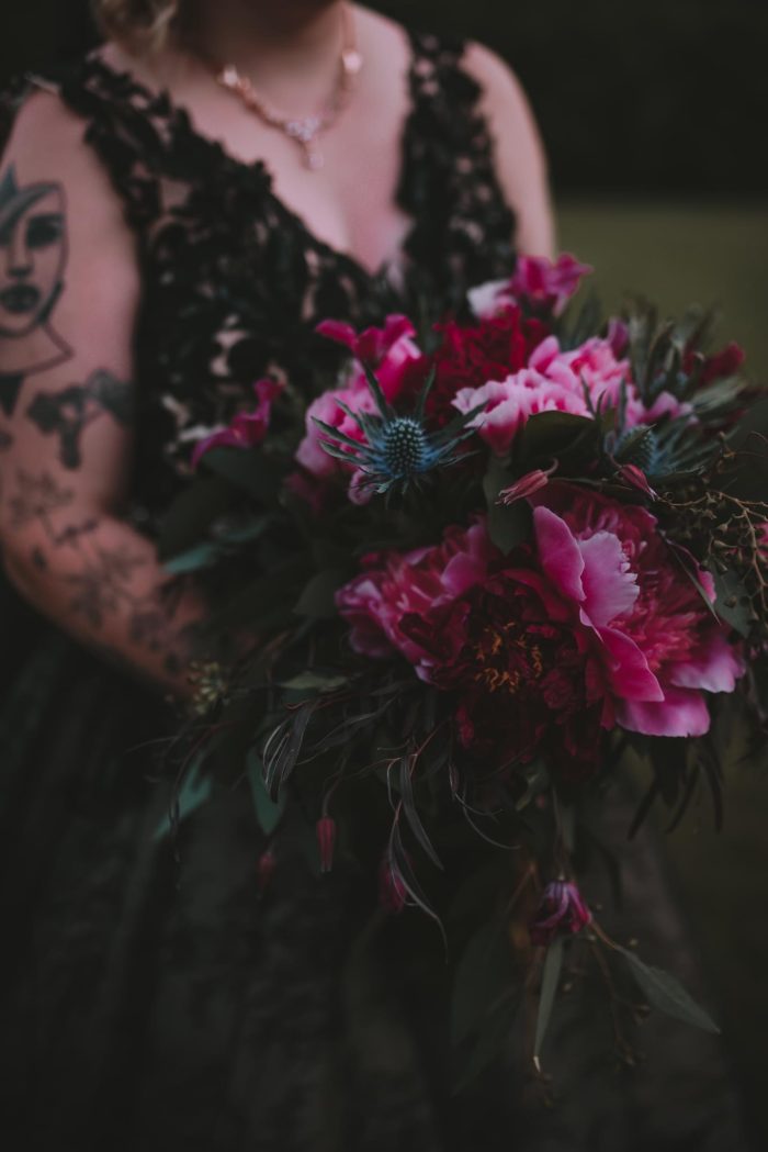 Bride In Black Wedding Dress Called Zander By Sottero And Midgley With Pantone Color Of The Year Flowers In Magenta