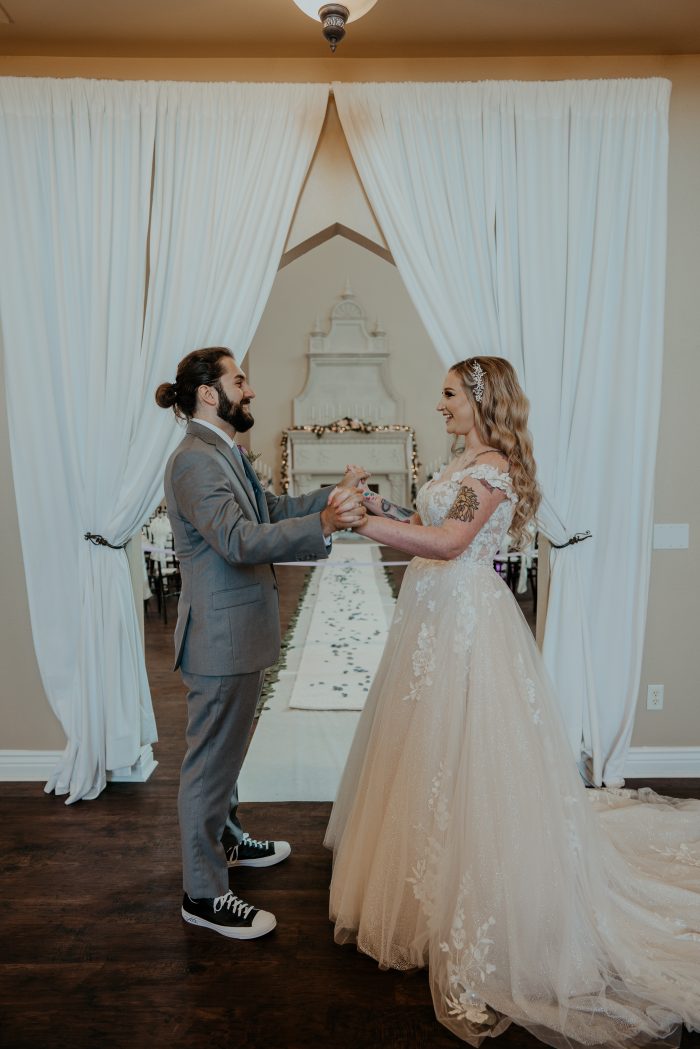 Bride In Lace A-Line Wedding Dress Called Harlem By Maggie Sottero With Groom