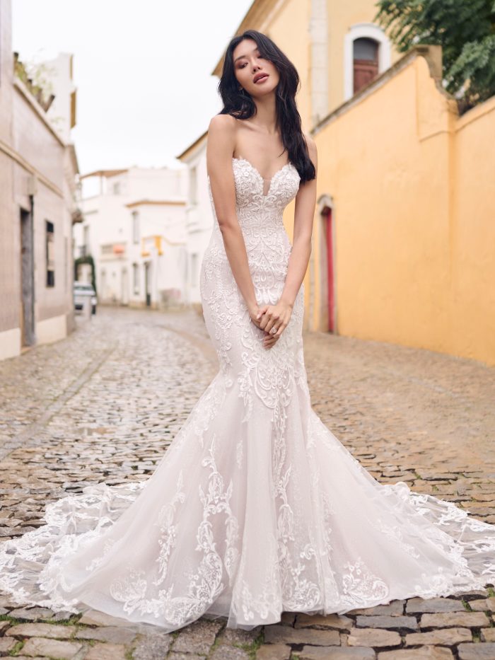 Bride In Sexy Fit-And-Flare Wedding Dress Called Frederique Royale By Maggie Sottero