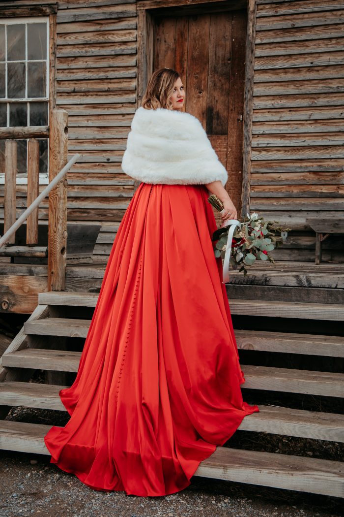 Bride In Valentines Day Dresses Called Scarlet By Maggie Sottero With Sparkly Boots, Fur Shawl, And Groom