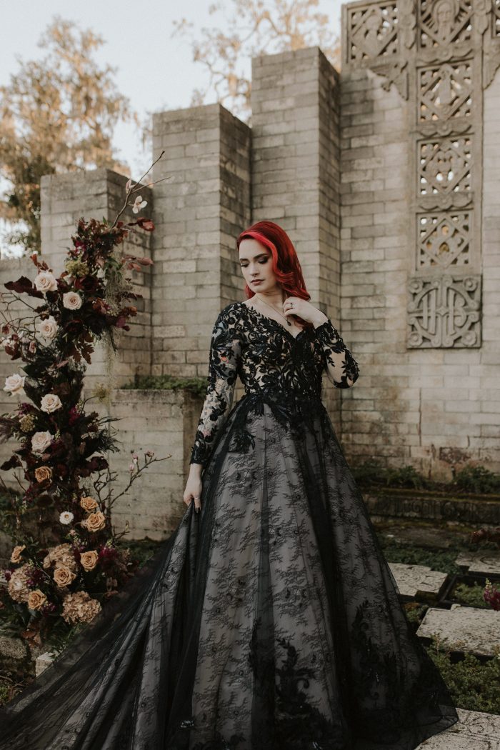 Bride In Long Sleeve Black Wedding Dress Called Zander By Sottero And Midgley