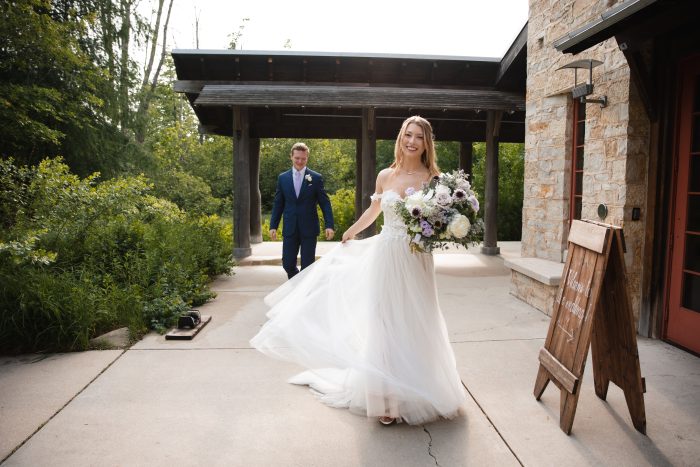 Bride In Floral Airy Wedding Dress Called Mirra By Maggie Sottero