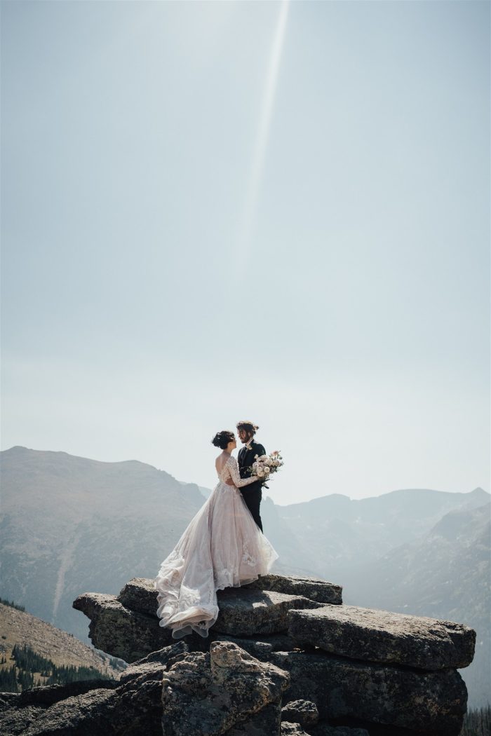 Bride In Long Sleeve Airy Wedding Dress Called Zander By Sottero And Midgley