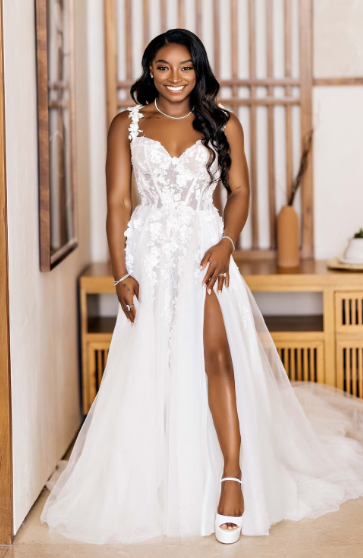 Simone Biles wearing one of our favorite celebrity wedding dresses