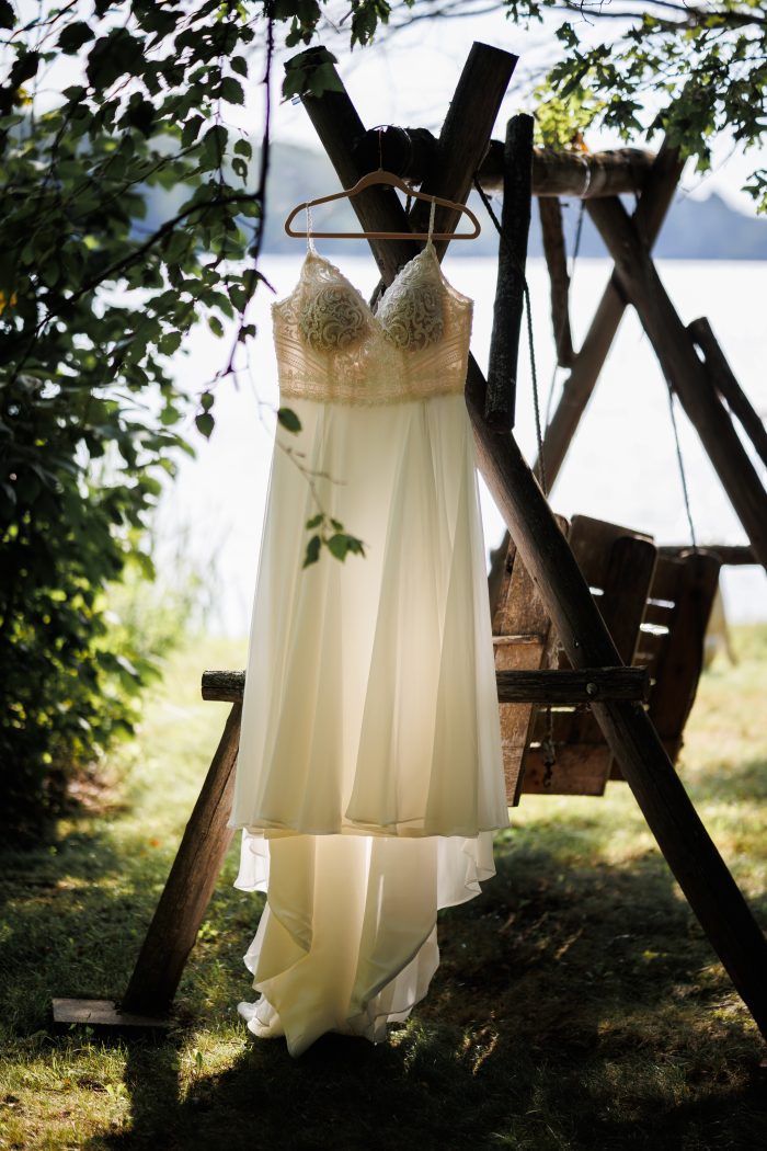 Bridal Gown Hanging From Swinging Chair