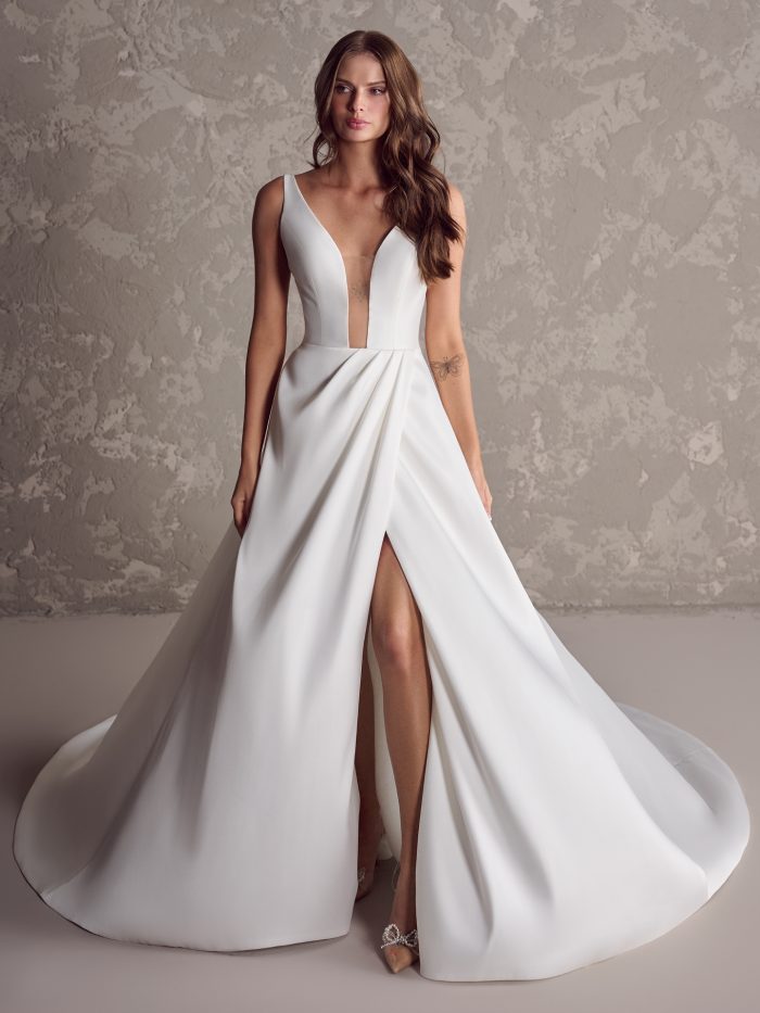 Bride Wearing High-Slit Lower Impact Fabric A-Line Bridal Dress Miranda by Maggie Sottero