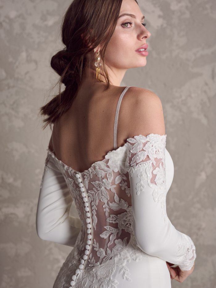 Bride Wearing Simple Long Sleeve Wedding Dress Tyra by Maggie Sottero