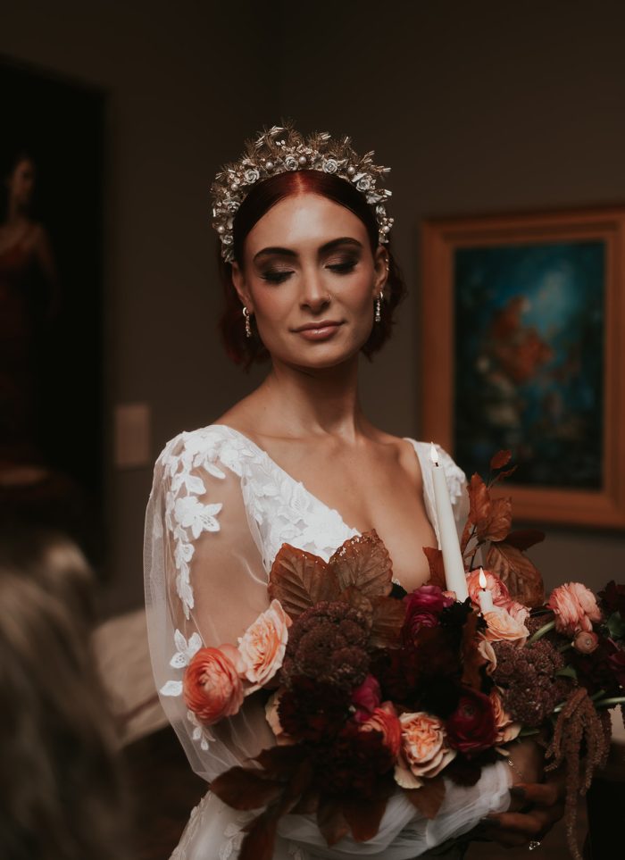 Bride wearing head piece as an accessory in fall wedding.