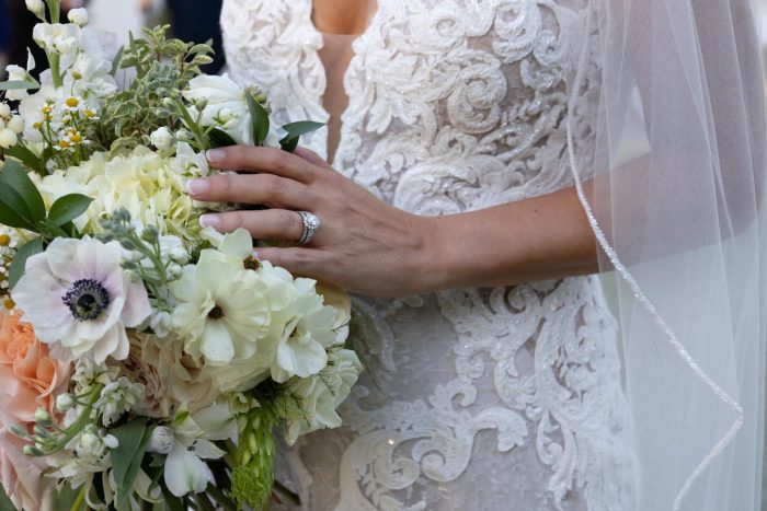 Bride wearing Tuscany Royale gown by Maggie Sottero