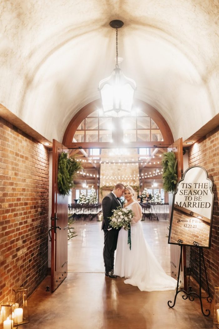 Bride wearing Joanne by Maggie Sottero at her winter wedding