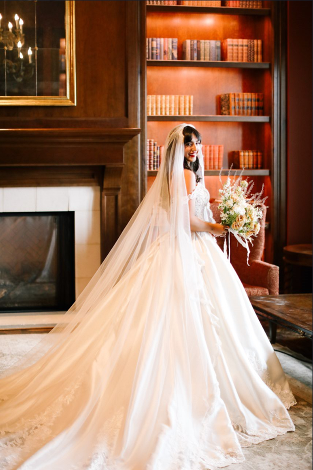 Back of bride wearing Kimora gown by Sottero and Midgley