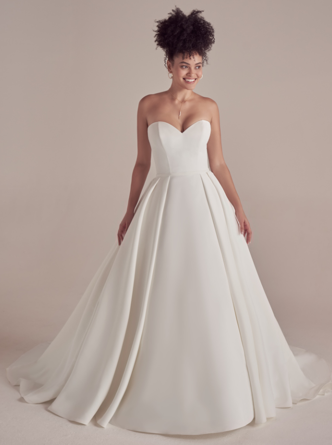 Model wearing Kyrie by Maggie Sottero, a wedding dress with pockets