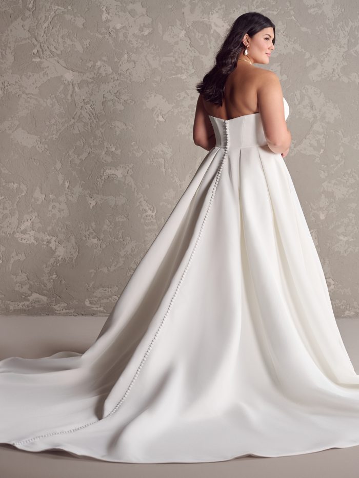 The back of a bride wearing Ambrose gown by Maggie Sottero