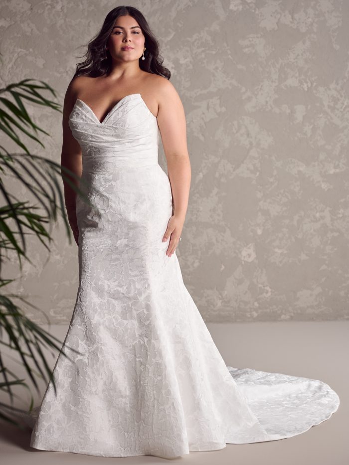Bride wearing plus size wedding dresses like Hilo by Maggie Sottero