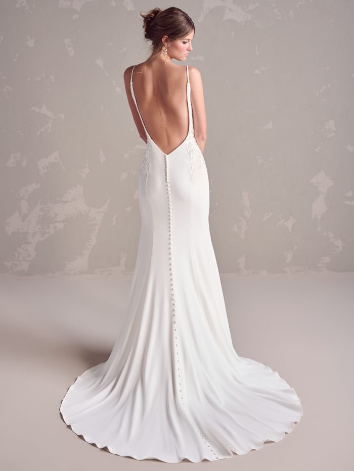 Themed wedding dresses including Storm by Rebecca Ingram being worn by bride