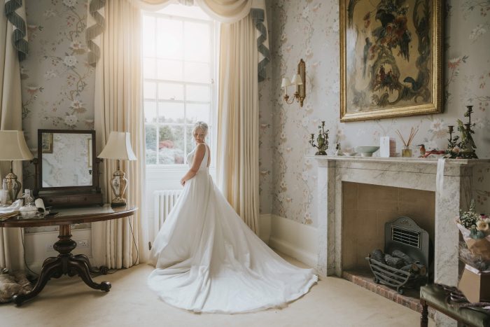 Bride wearing Symphony gown by Maggie Sottero