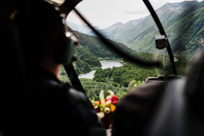 Helicopter ride to destination wedding location in Alaska