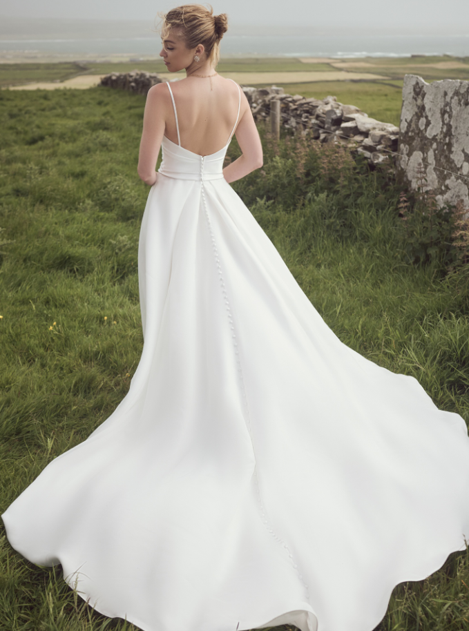 The back of a bride wearing Sophie by Rebecca Ingram