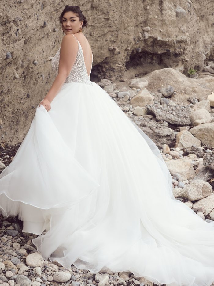 Back of a bride wearing Bannock wedding gown by Sottero and Midgley
