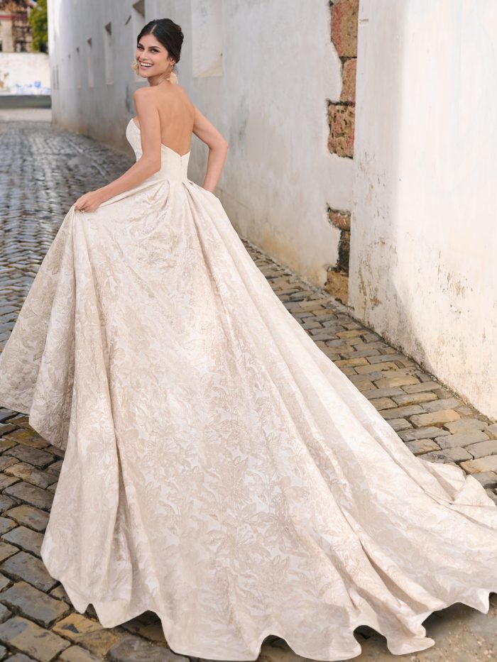 Model wearing Cyprus by Sottero and Midgley