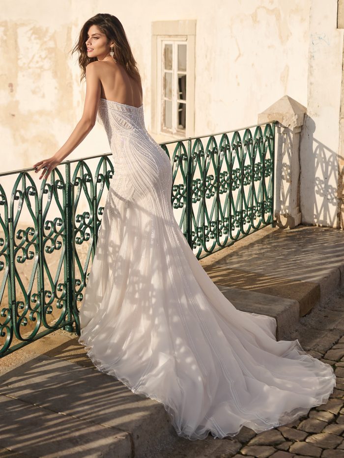 Bride wearing Positano themed wedding dresses by Sottero and Midgley