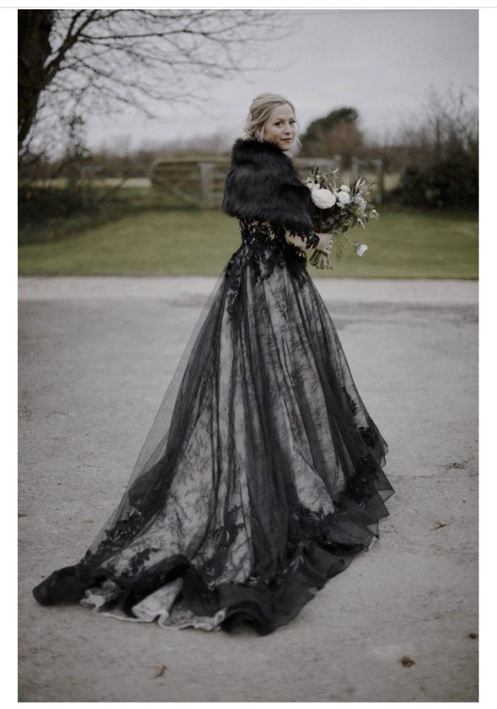 Bride wearing Zander wedding gown by Sottero and Midgley, which works wonderfully for winter wedding themes
