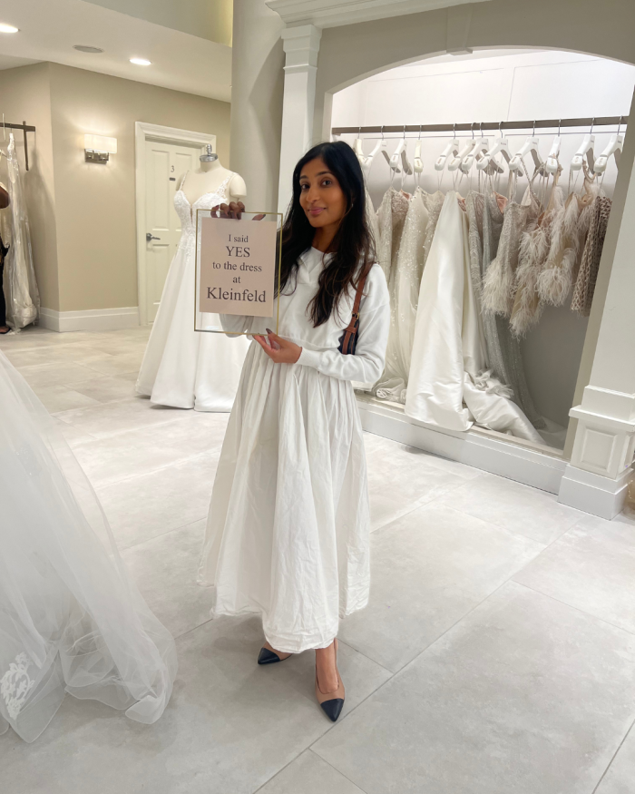 Bride with a positive body image saying yes to her dress