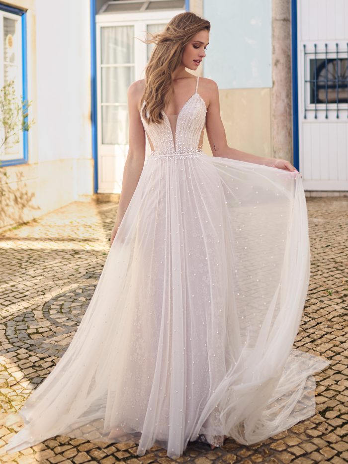 Bride wearing a summer wedding dress named Betsy by Maggie Sottero