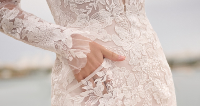 Bride with hand in pocket of dress