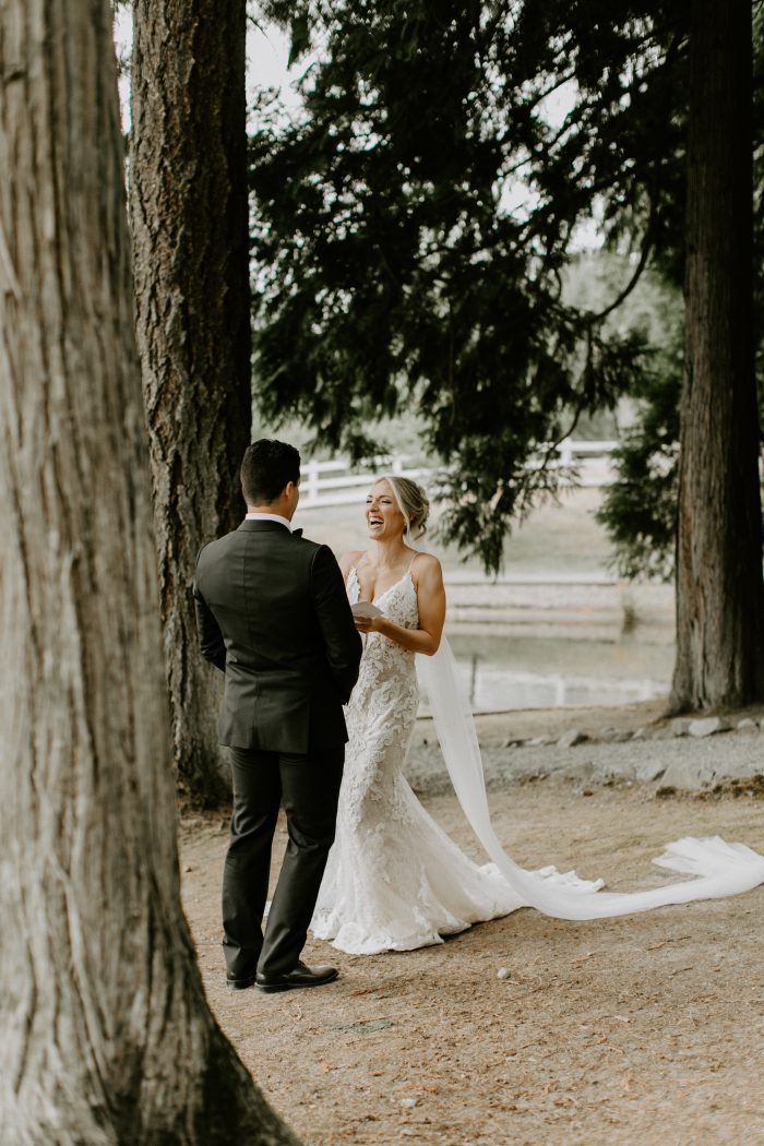 Bride wearing Tuscany Lynette wedding dress by Maggie Sottero and groom laughing