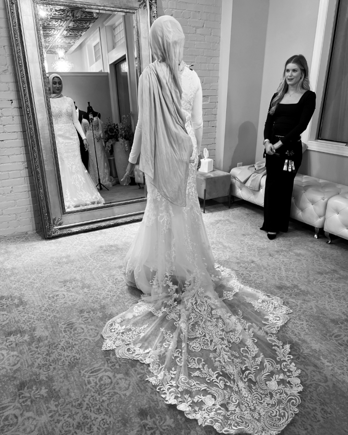 Bride trying on a Maggie Sottero gown