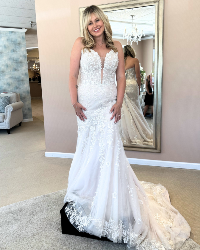 Bride trying on a wedding dress and sharing her wedding dress shopping tips