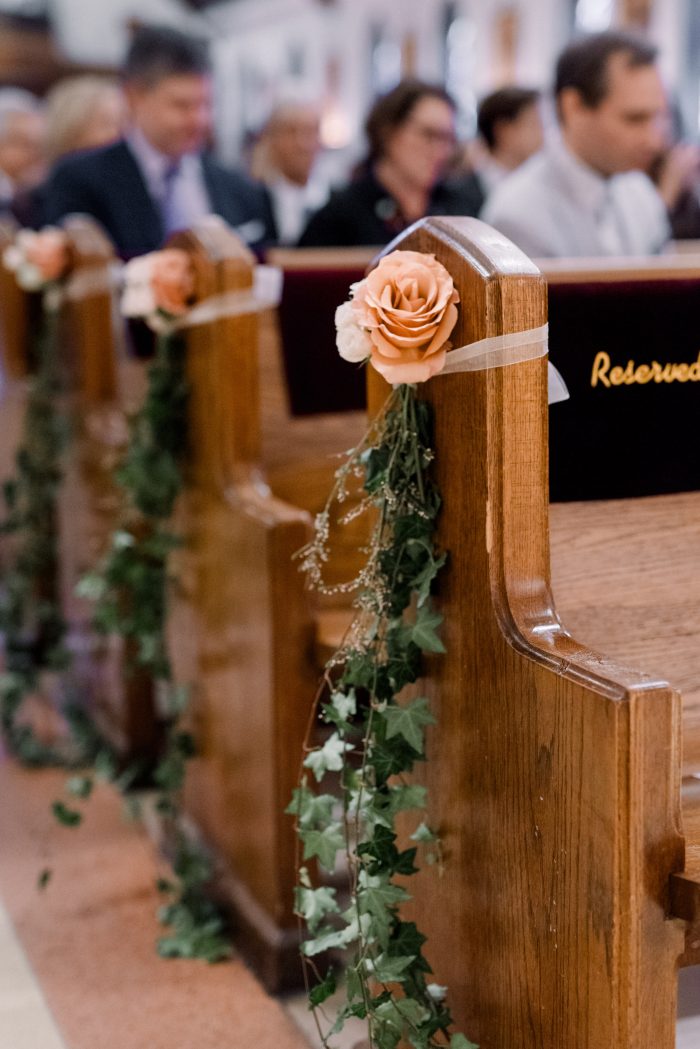 Aisle markers with the Pantone Color of the Year 2024 florals