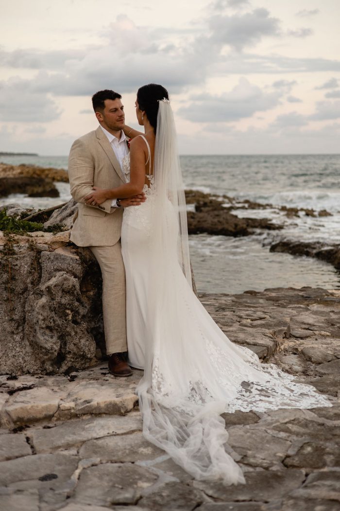 Bride wearing Baxley crepe fabric wedding dress by Maggie Sottero